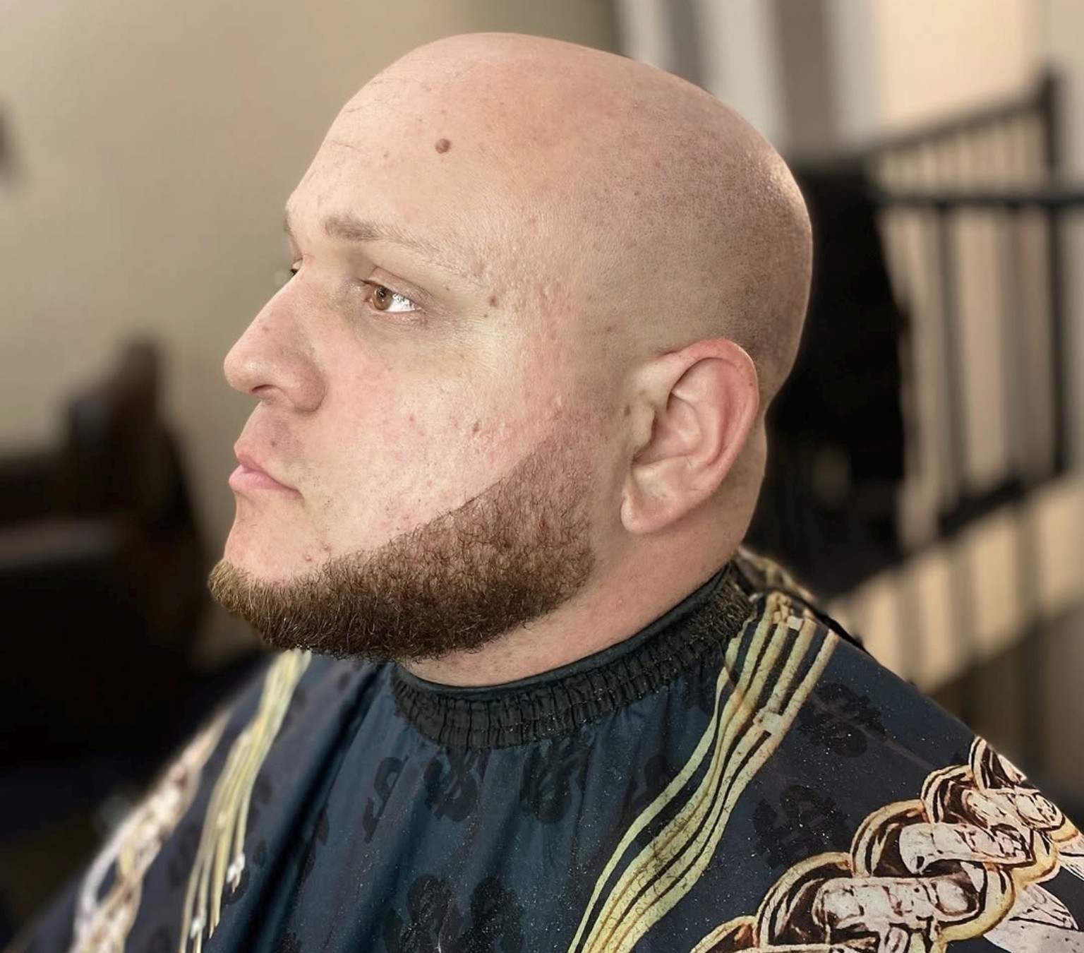 Strakke fade met verzorgde baard